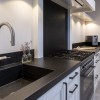 Keuken en wasbakken in graniet - door Van Houts